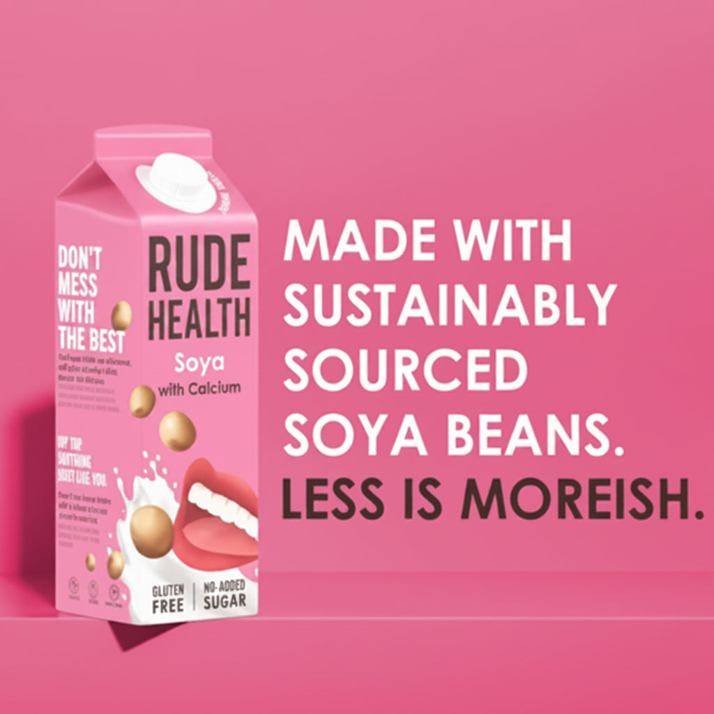 Rude Health soya product packaging on a pink background with text about sustainably sourced soya beans.