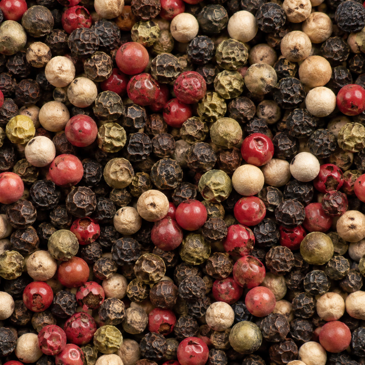 Extreme close-up of mixed peppercorns