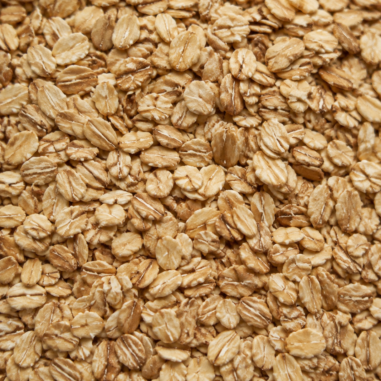 Extreme close-up of Infinity Foods Organic Muesli Base cereal flakes