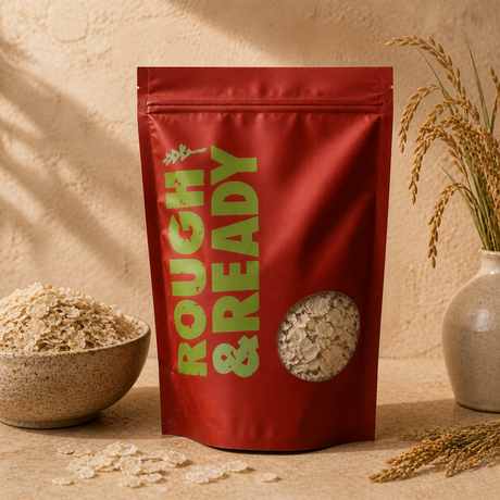 Organic Brown Rice Flakes in a Rough & Ready pouch with a ceramic bowl of flakes