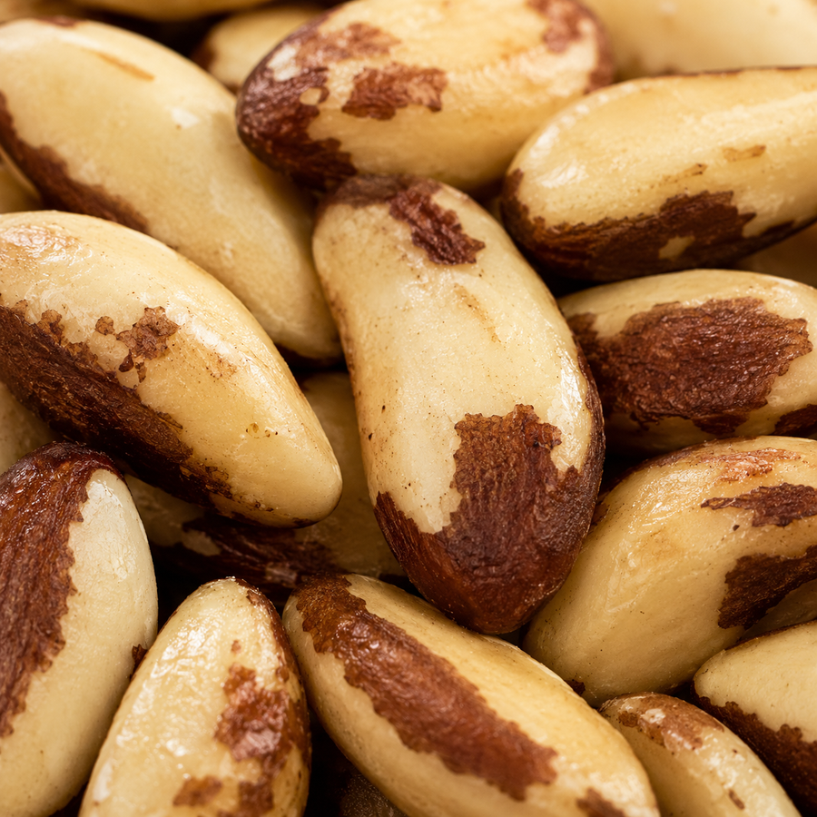 Close-up of Brazil nuts with brown and beige coloration.