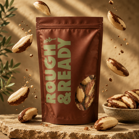 Brown package labeled 'Rough & Ready' with almonds around on a wooden surface.