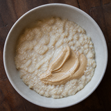 Biona organic smooth cashew butter served over porridge