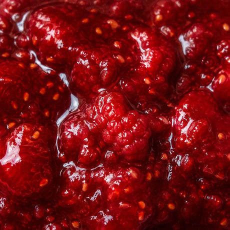 Bionova Organic Raspberry Jam — macro ingredient hero