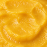 Extreme close-up of Clearspring organic apple and mango puree