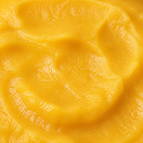 Extreme close-up of Clearspring organic apple and mango puree