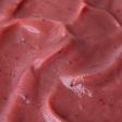 Extreme close-up of Clearspring organic apple and plum puree