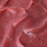 Extreme close-up of Clearspring organic apple and plum puree