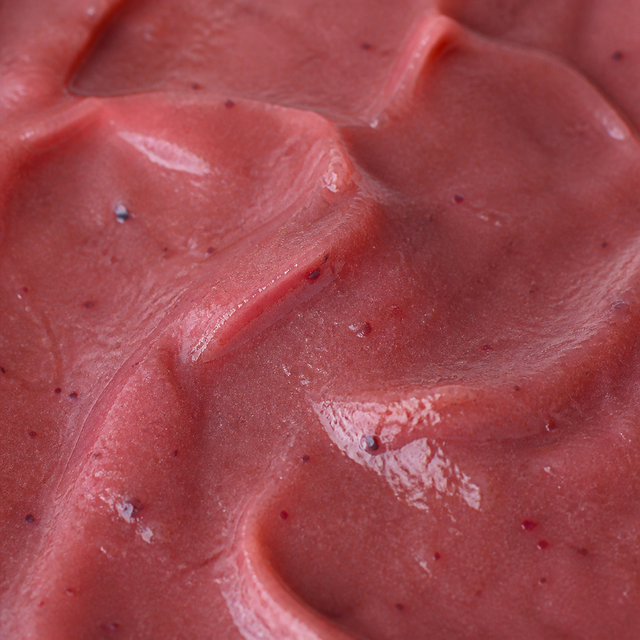 Extreme close-up of Clearspring organic apple and plum puree