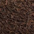 Extreme close-up of roasted Hojicha green tea leaves