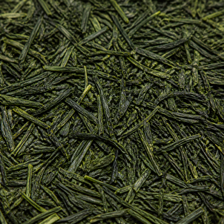 Extreme close-up of organic Sencha green tea leaves