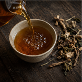Organic dandelion tea being poured