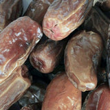 Extreme close-up of organic Deglet Nour pitted dates