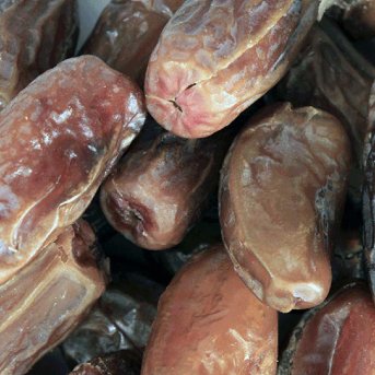 Extreme close-up of organic Deglet Nour pitted dates