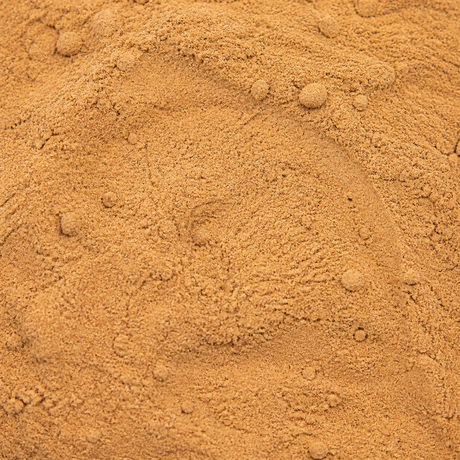 Extreme close-up of fine organic camu camu powder