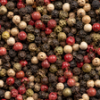 Extreme close-up of mixed peppercorns