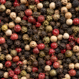 Extreme close-up of mixed peppercorns