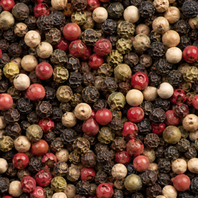 Extreme close-up of mixed peppercorns