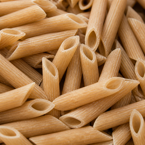 Extreme close-up of dry organic brown rice penne