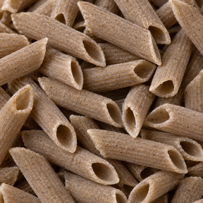 Extreme close-up of dry organic buckwheat penne