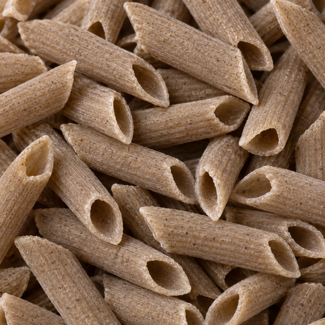 Extreme close-up of dry organic buckwheat penne