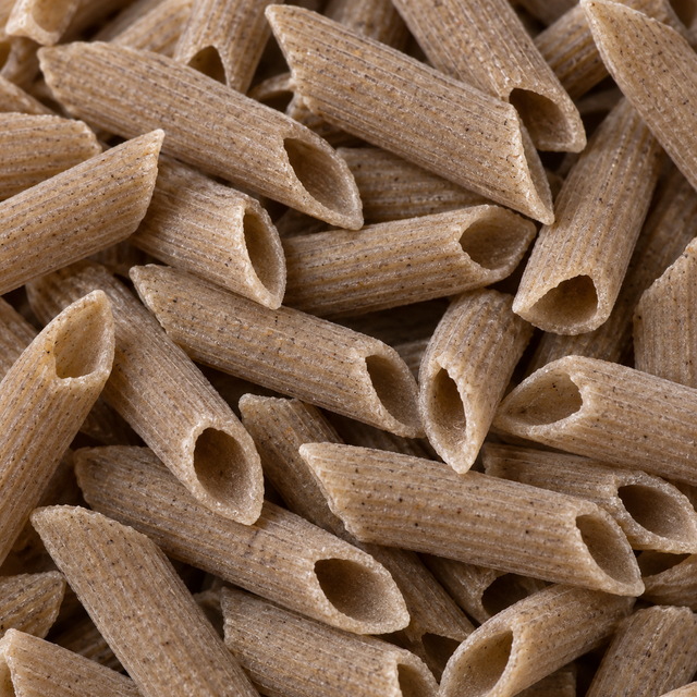 Extreme close-up of dry organic buckwheat penne