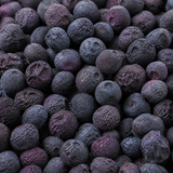 Extreme close-up of dry freeze-dried blueberries