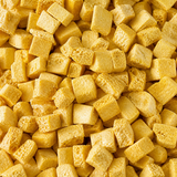 Extreme close-up of freeze-dried passion fruit cubes