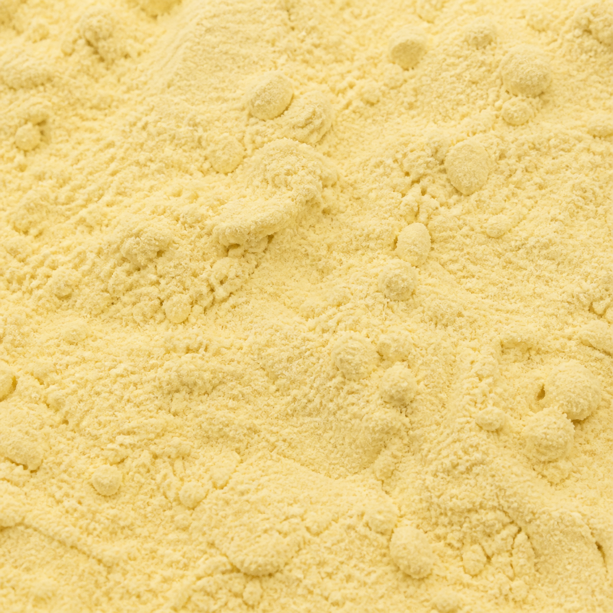 Extreme close-up of freeze-dried pineapple powder