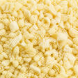 Extreme close-up of freeze-dried small pineapple nibs