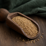 Infinity Foods Organic Bulghur Wheat in a walnut scoop