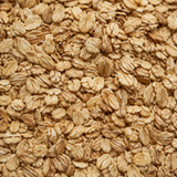 Extreme close-up of Infinity Foods Organic Muesli Base cereal flakes
