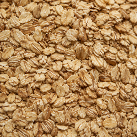 Extreme close-up of Infinity Foods Organic Muesli Base cereal flakes