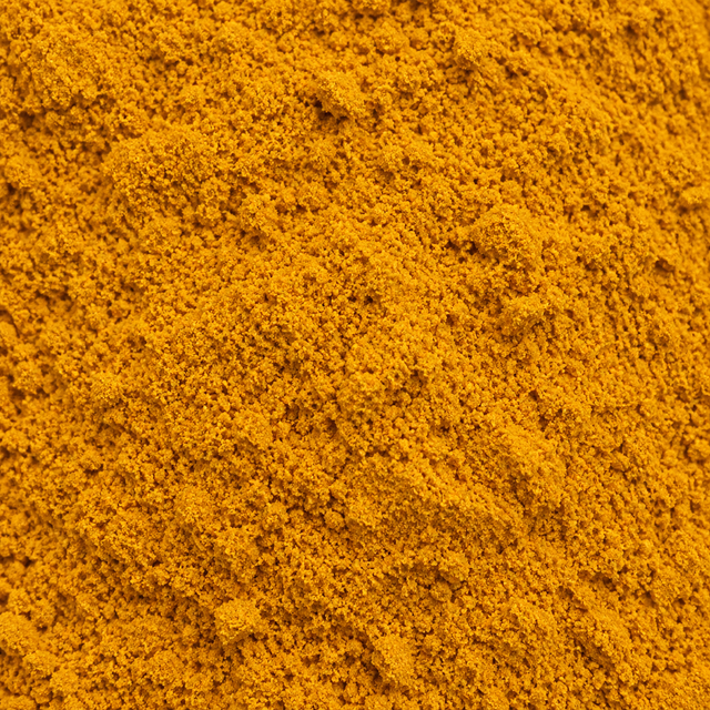 Organic turmeric powder extreme close-up