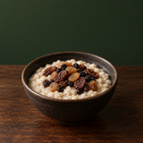 Porridge topped with Infinity Organic Mixed Vine Fruit