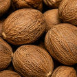 Extreme close-up of organic whole nutmeg