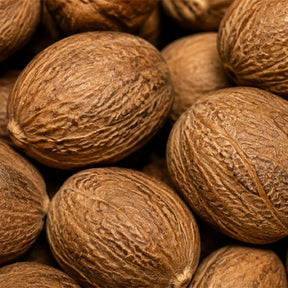 Extreme close-up of organic whole nutmeg