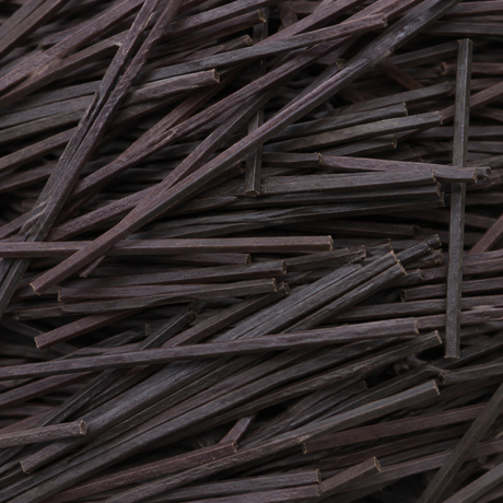 Extreme close-up of dry organic black rice noodles