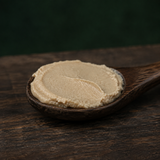 Spoonful of organic smooth cashew butter