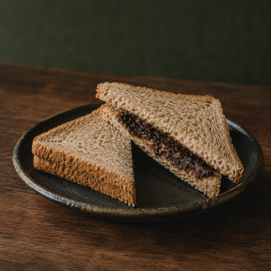 Wholemeal sandwich with a thin yeast extract filling