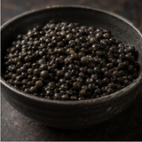 Cooked organic black beluga lentils serving
