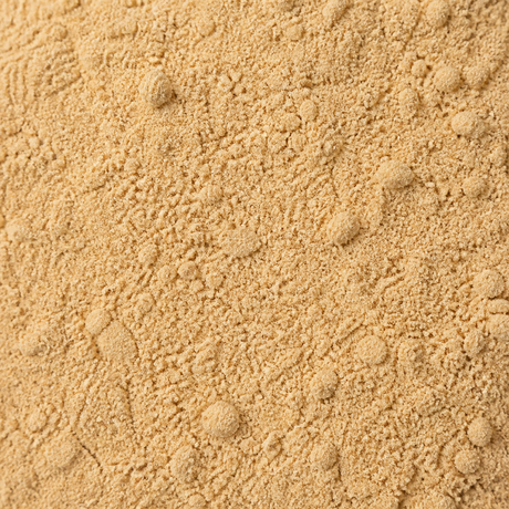 Extreme close-up of organic black maca powder