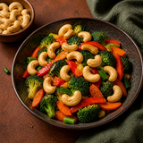 Organic cashew nuts topping a colourful vegetable stir-fry