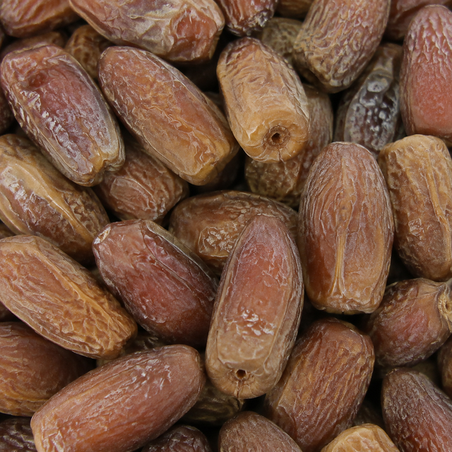 Extreme close-up of organic Deglet Nour pitted dates