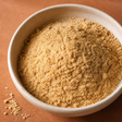 Close-up of organic ground golden flaxseed meal