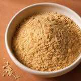 Close-up of organic ground golden flaxseed meal