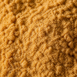 Extreme close-up of organic ground golden flaxseed (linseed)