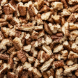 Extreme close-up of organic pecan pieces