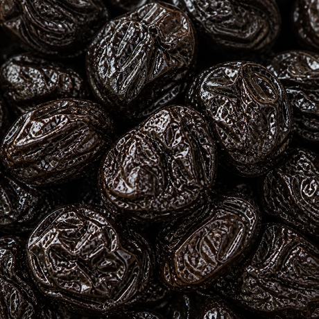 Extreme close-up of organic pitted prunes