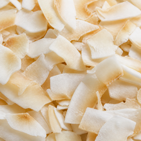 Organic toasted coconut flakes extreme close-up